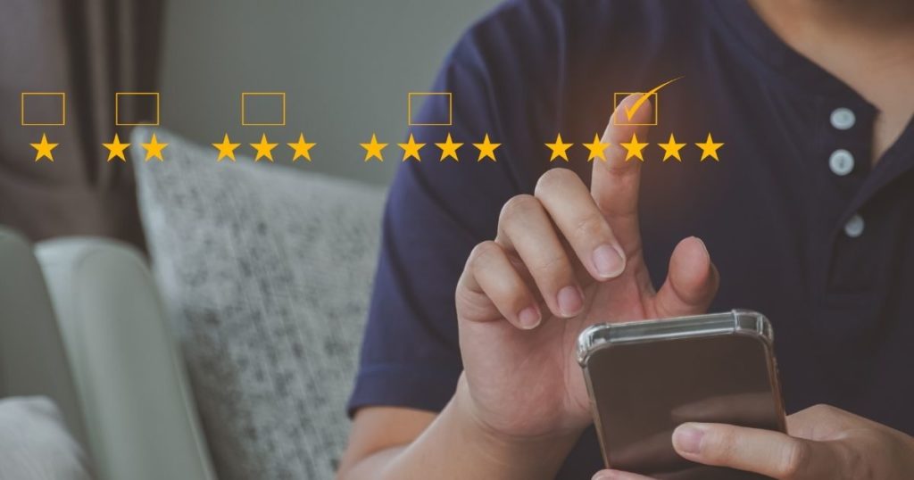 How to encourage customers to write reviews? A customer writing a review.